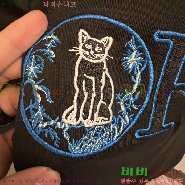    Ƽ D97711-2