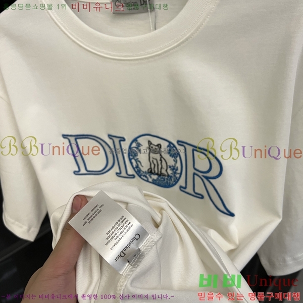    Ƽ D97711-1